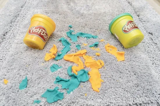playdough in carpet