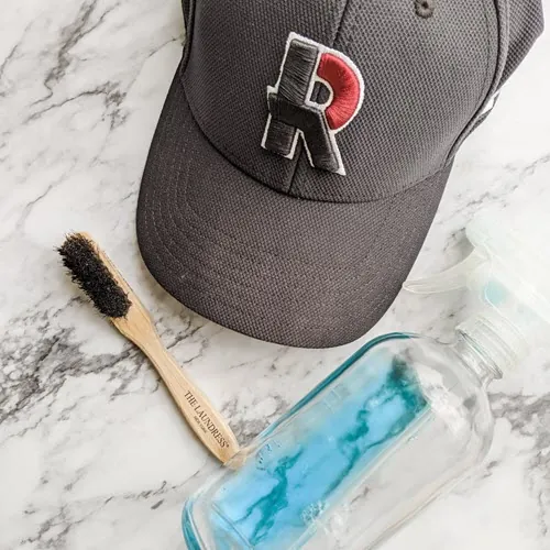 cleaning a sweaty hat